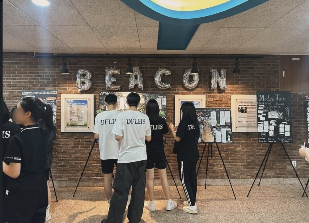 BEACON exhibit display at school, with balloon lettering