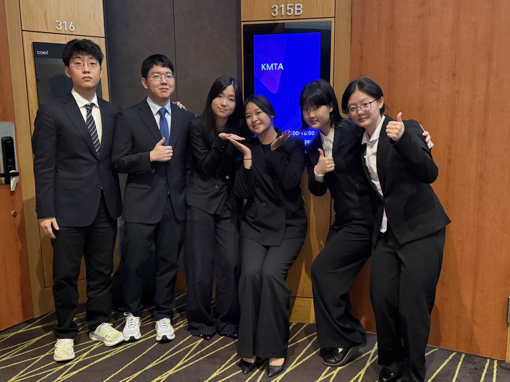 HAFS KMTA team posing together at the competition venue