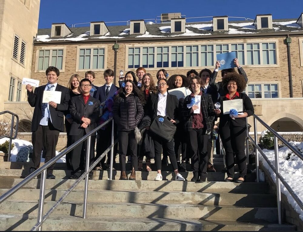 Group photo with certificates at a U.S. MUN conference